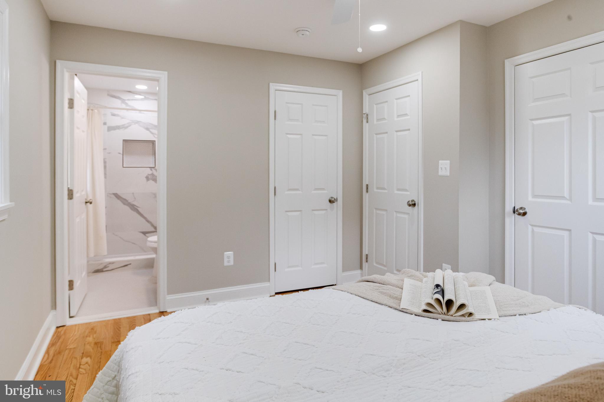 733 Reckord Road Fallston, MD 21047 - Photo 21 of 71 a bedroom with a bed and a chandelier