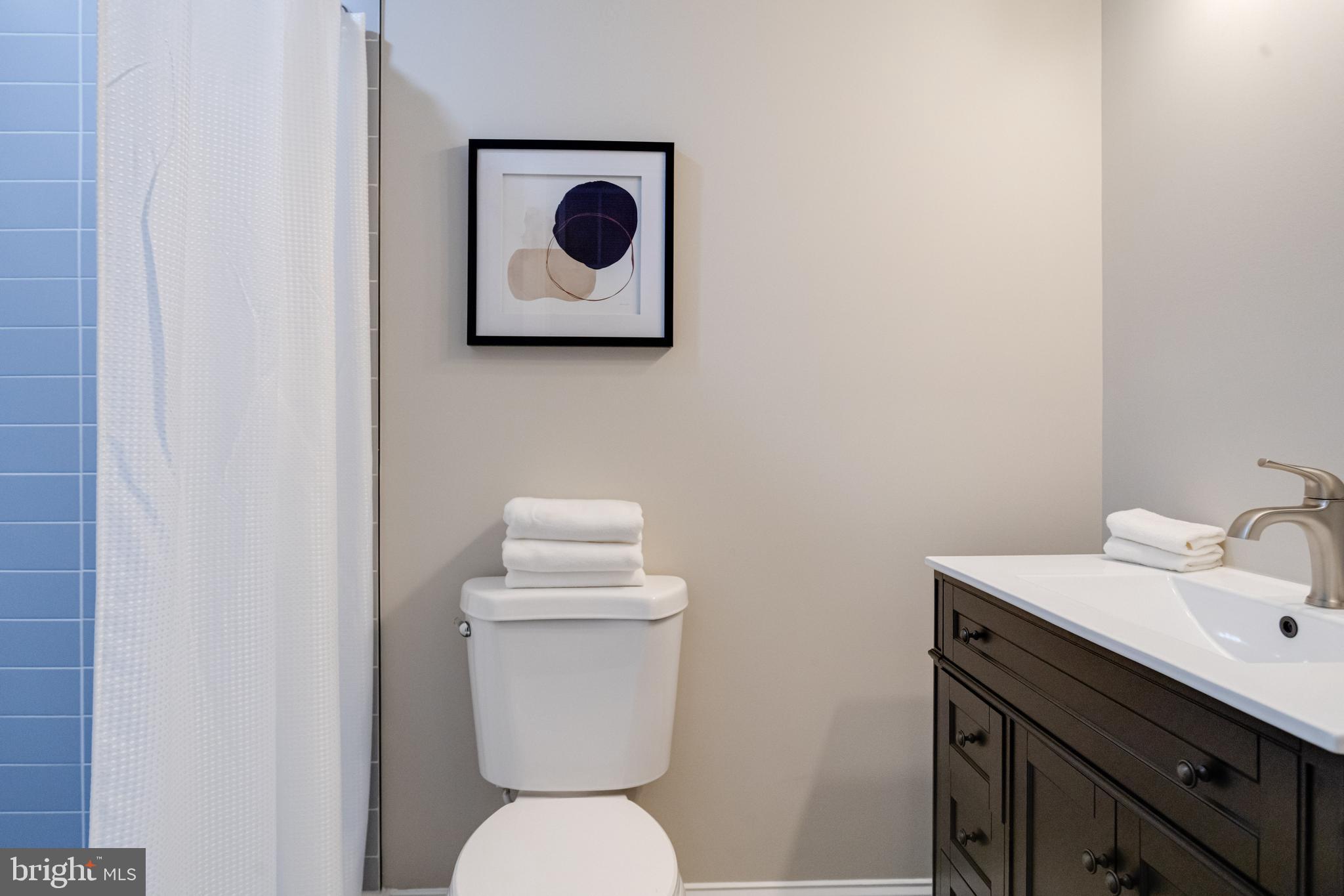 733 Reckord Road Fallston, MD 21047 - Photo 29 of 71 a bathroom with a toilet sink vanity and mirror