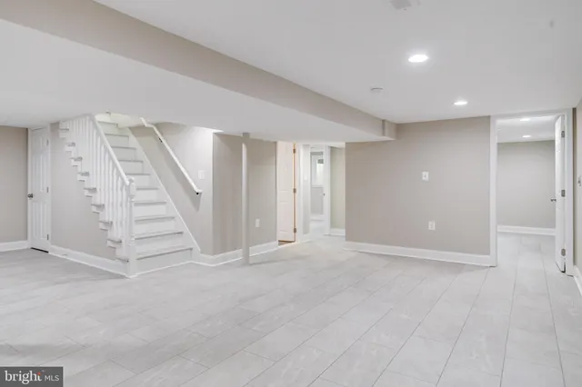 a bathroom with a toilet a sink and bathtub