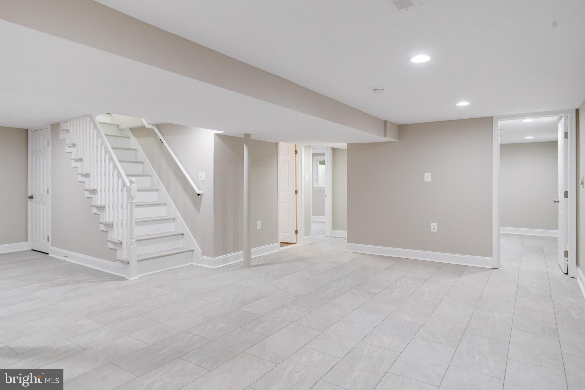 733 Reckord Road Fallston, MD 21047 - Photo 38 of 71 an empty room with a ceiling fan and entryway