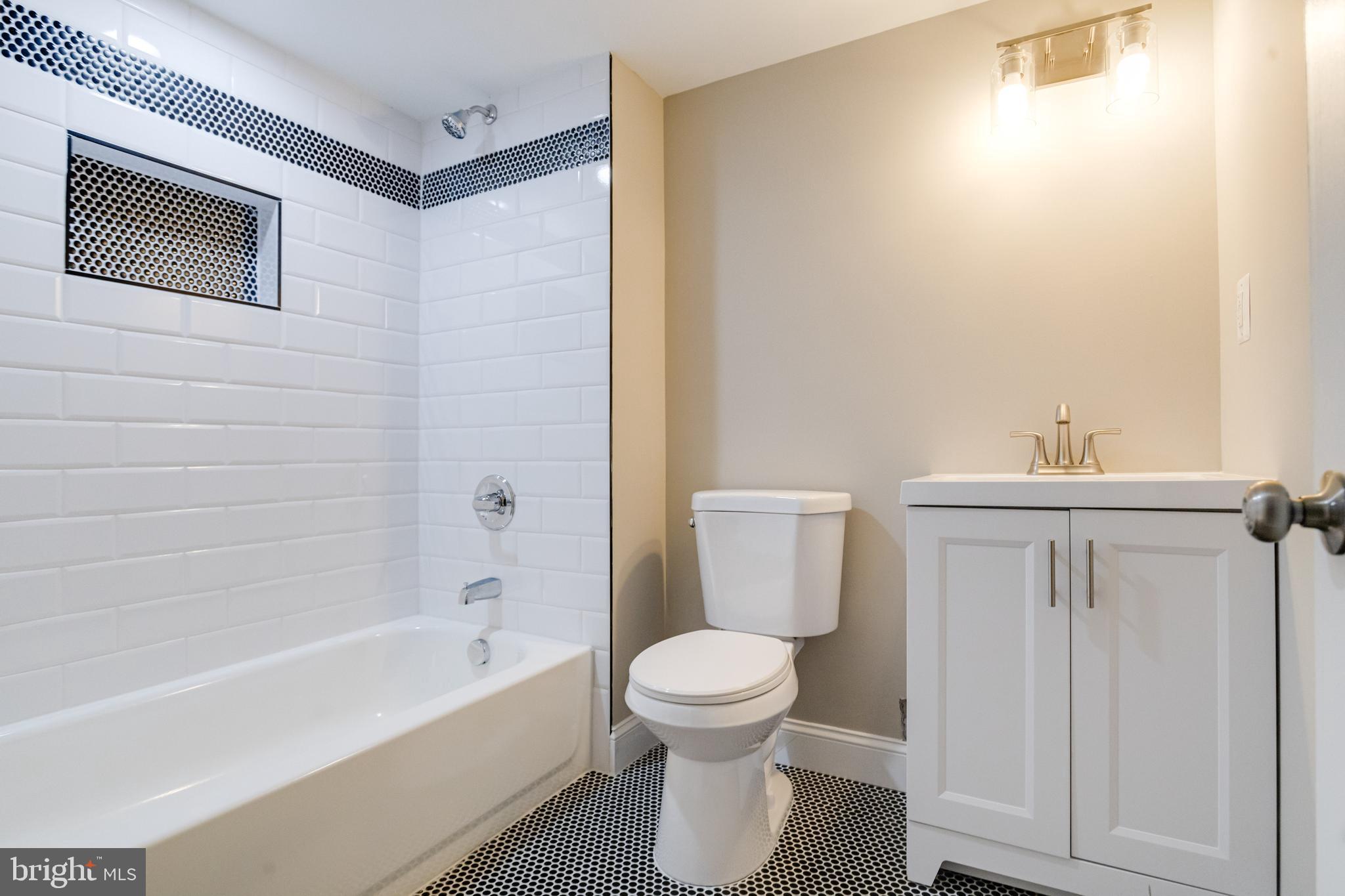 733 Reckord Road Fallston, MD 21047 - Photo 48 of 71 a bathroom with a toilet a sink and bathtub