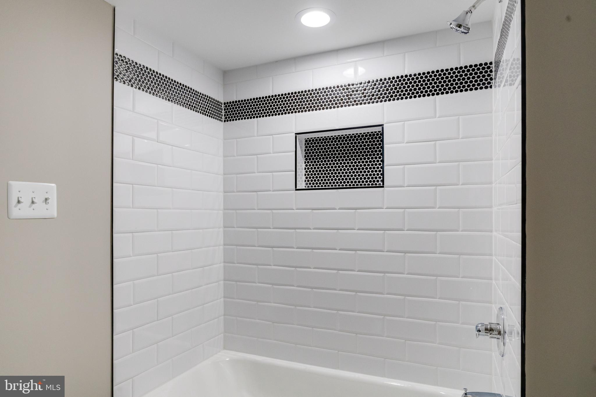 733 Reckord Road Fallston, MD 21047 - Photo 49 of 71 a bathroom with a shower and a window