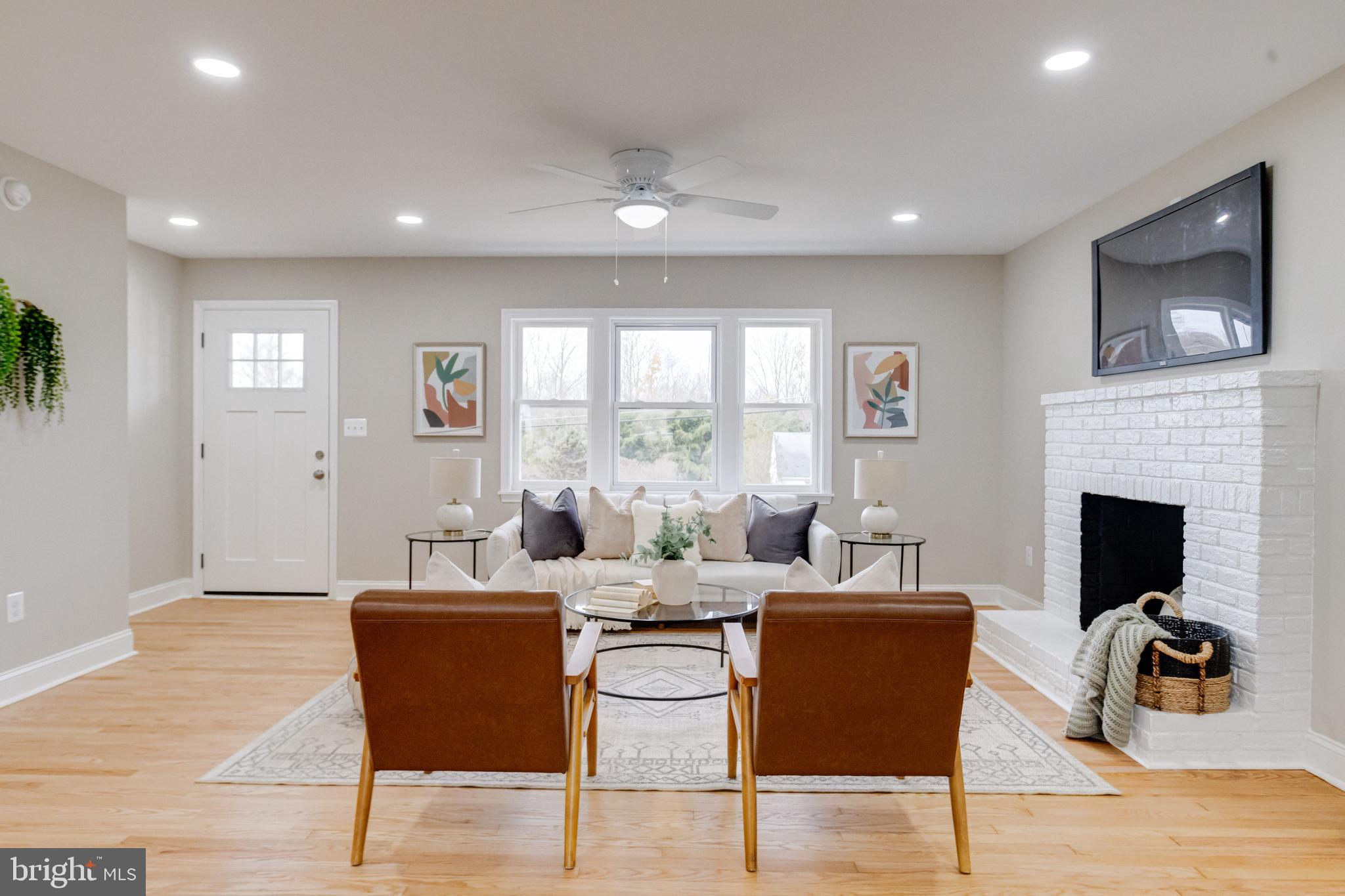 733 Reckord Road Fallston, MD 21047 - Photo 7 of 71 a living room with fireplace furniture and a flat screen tv