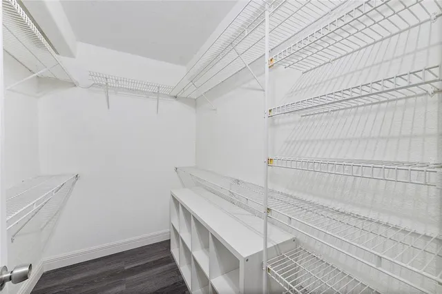 a view of a room with racks on the wall