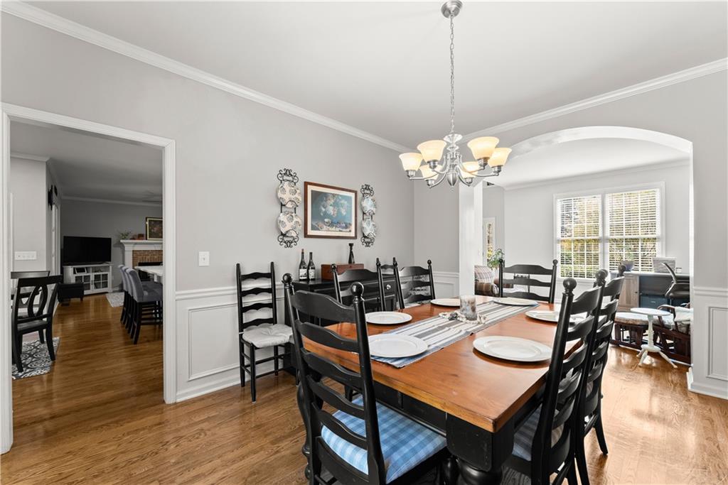 200 Morning Glory Ridge Canton, GA 30115 - Photo 11 of 88 a view of a dining room with furniture window and wooden floor