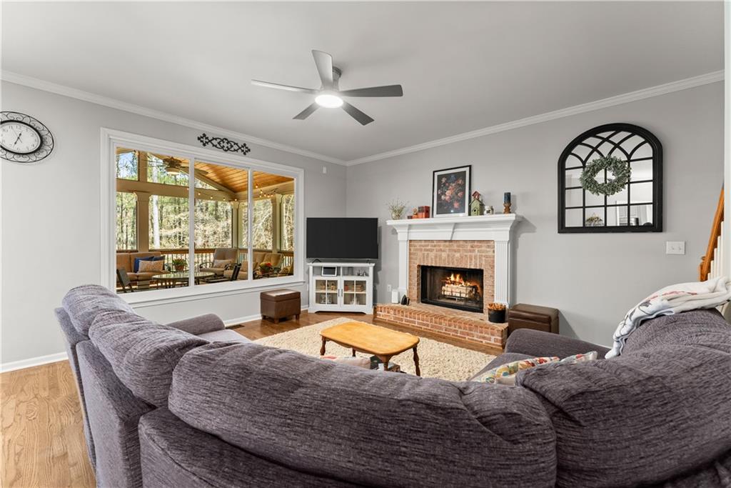 200 Morning Glory Ridge Canton, GA 30115 - Photo 12 of 88 a living room with furniture large window and fireplace
