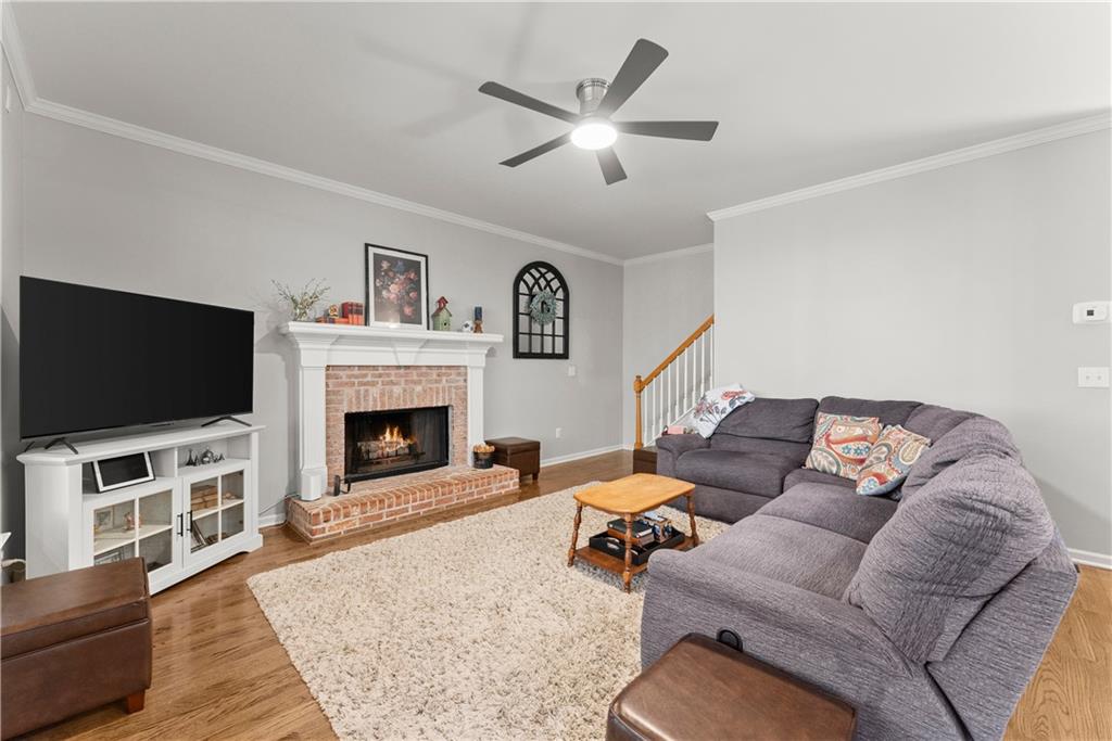 200 Morning Glory Ridge Canton, GA 30115 - Photo 13 of 88 a living room with furniture and a flat screen tv