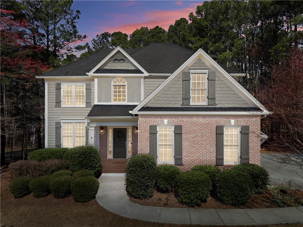 200 Morning Glory Ridge Canton, GA 30115 - Photo 2 of 88 a front view of a house with a yard