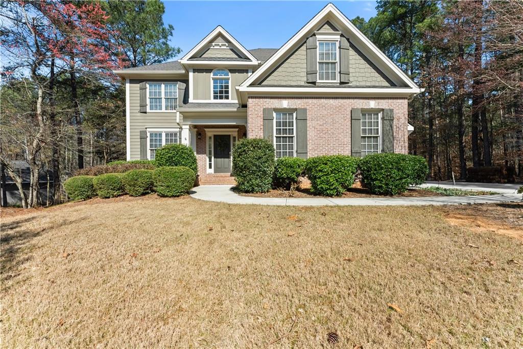 200 Morning Glory Ridge Canton, GA 30115 - Photo 3 of 88 a front view of a house with a yard