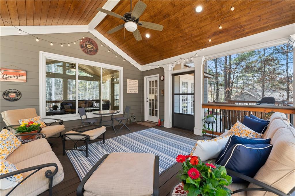 200 Morning Glory Ridge Canton, GA 30115 - Photo 32 of 88 a living room with furniture and a floor to ceiling window