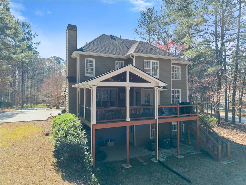 200 Morning Glory Ridge Canton, GA 30115 - Photo 57 of 88 a front view of a house with a yard