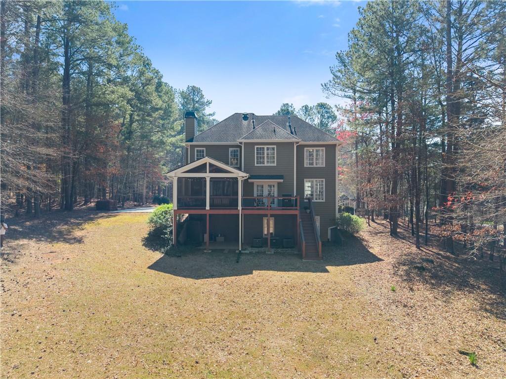 200 Morning Glory Ridge Canton, GA 30115 - Photo 60 of 88 a front view of a house with a yard