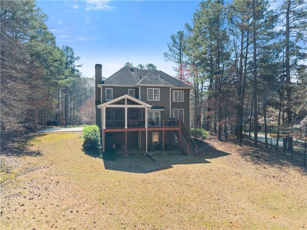 200 Morning Glory Ridge Canton, GA 30115 - Photo 61 of 88 a front view of a house with a yard