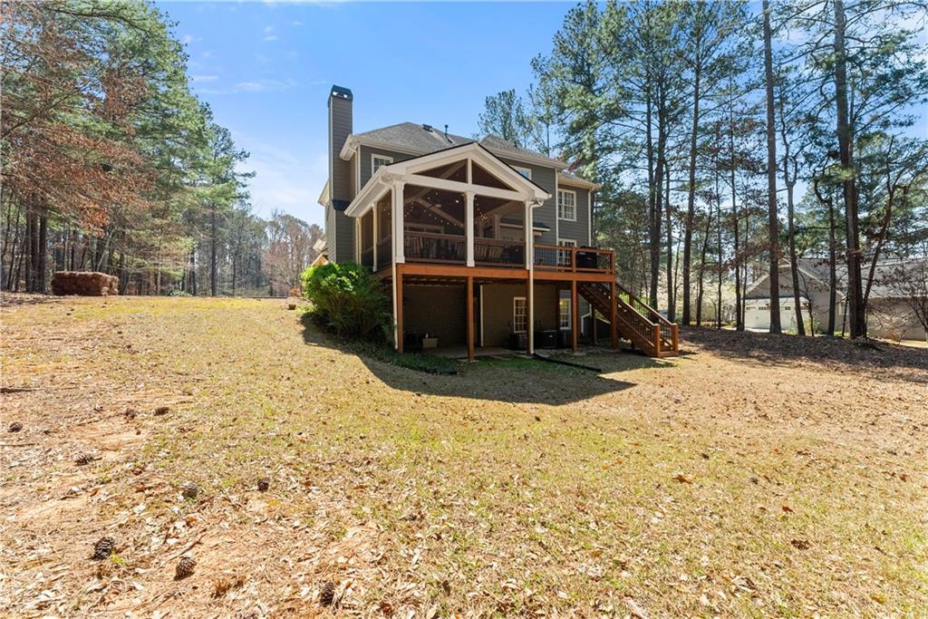 200 Morning Glory Ridge Canton, GA 30115 - Photo 66 of 88 a view of a house with a yard