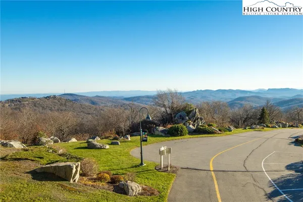 a view of an outdoor space and mountains