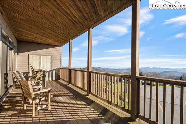 a view of balcony with chairs