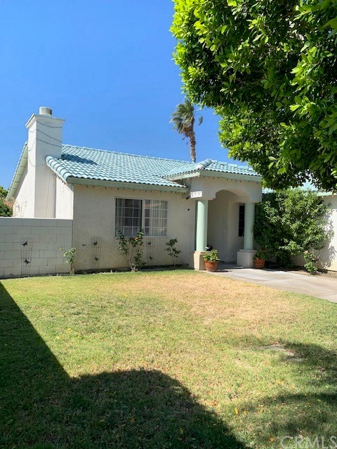 67145 Rango Road Cathedral City, CA 92234 - Photo 1 of 25 Large manicured front yard.