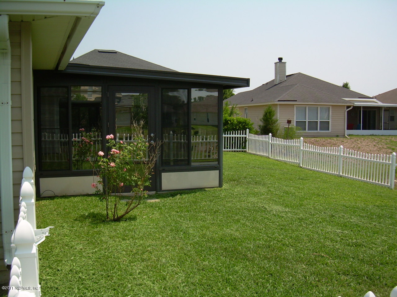 Back with screened in porch