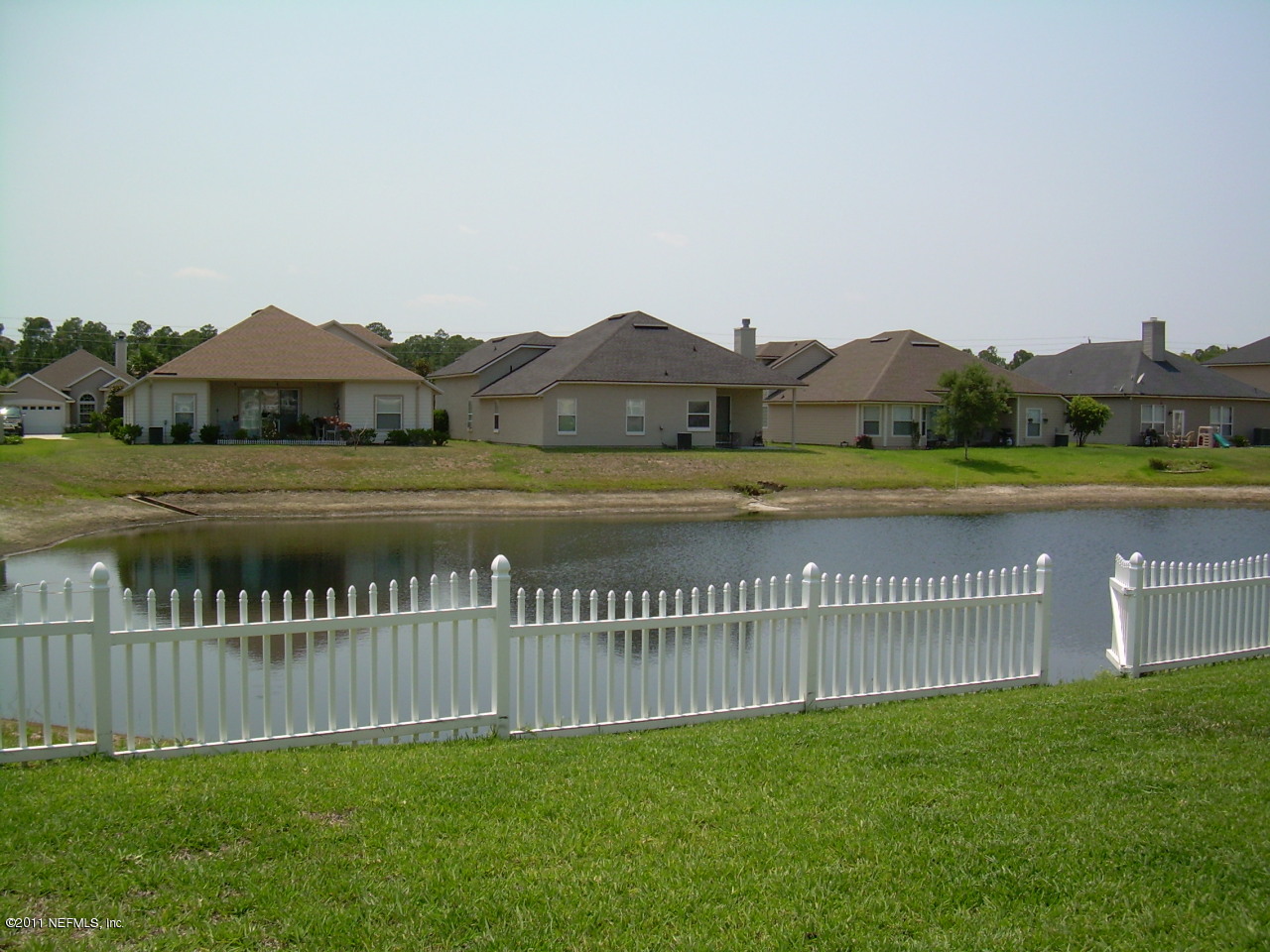 96156 Ridgewood Circle Fernandina Beach, FL 32034 - Photo 9 of 11 View from backyard to neighbors