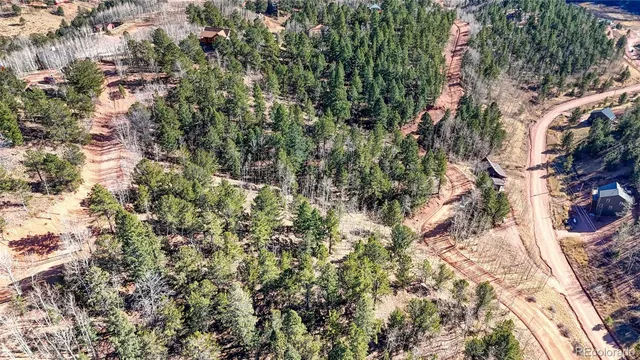 a view of a house with a tree