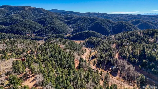 a view of a house in a field