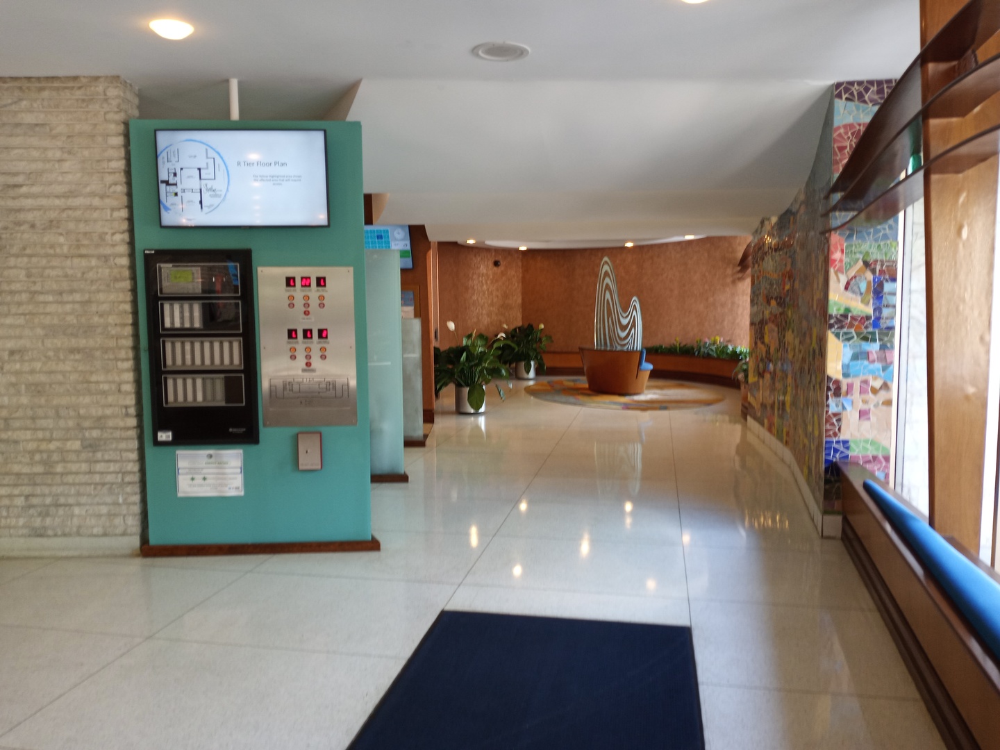 6301 North Sheridan Road, Unit 4H Chicago, IL 60660 - Photo 15 of 17 a view of a lobby with furniture and a floor to ceiling window