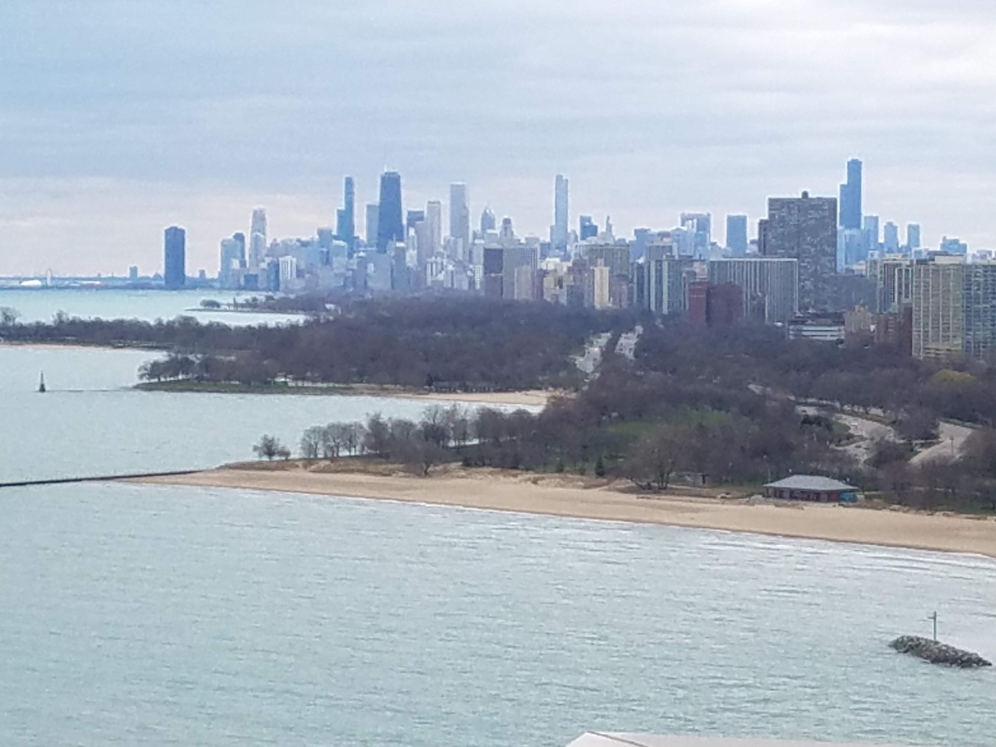 6301 North Sheridan Road, Unit 4H Chicago, IL 60660 - Photo 2 of 17 a view of a city
