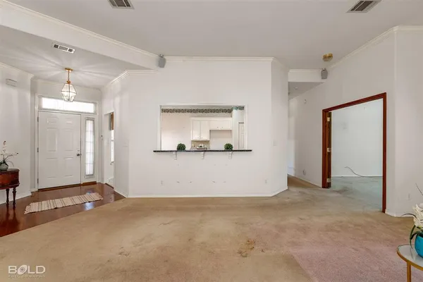 a view of a room with an empty space