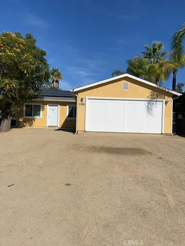 a view of a house with a swimming pool