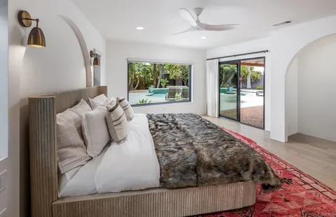 a bathroom with a double vanity sink mirror and