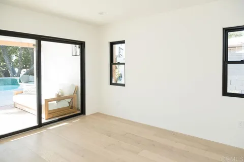 an empty room with sliding door