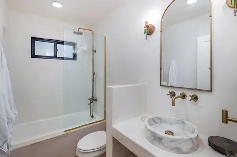 a workspace with furniture and window