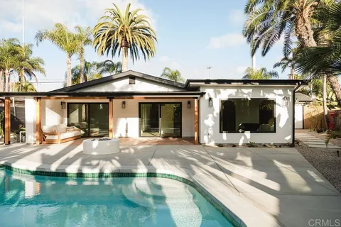 a view of a playground with basketball court