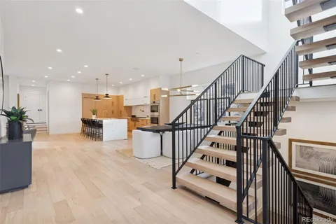a kitchen that has a lot of cabinets in it