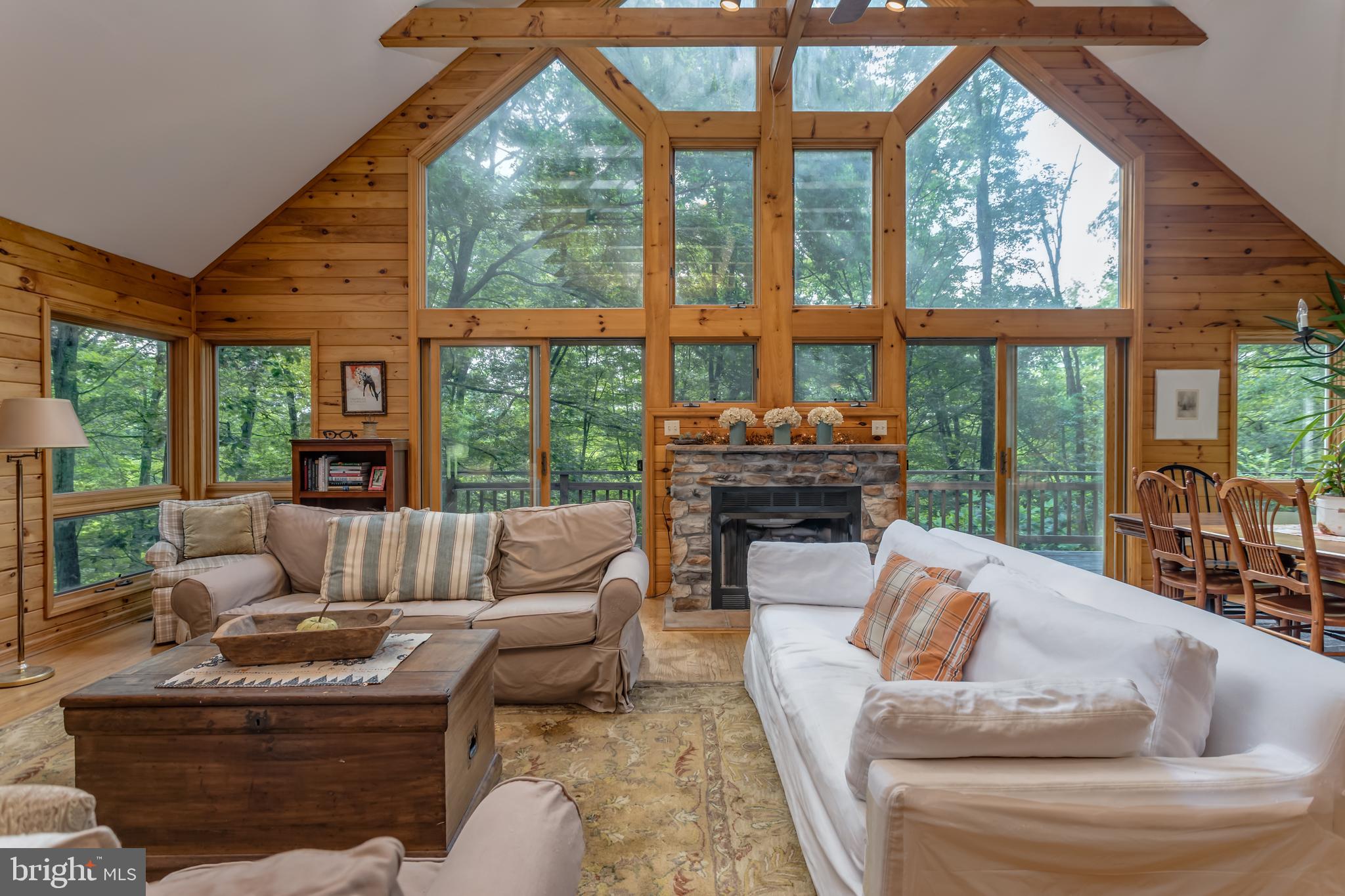 379 Wintergreen Way Berkeley Springs, WV 25411 - Photo 11 of 55 a living room with furniture and a large window