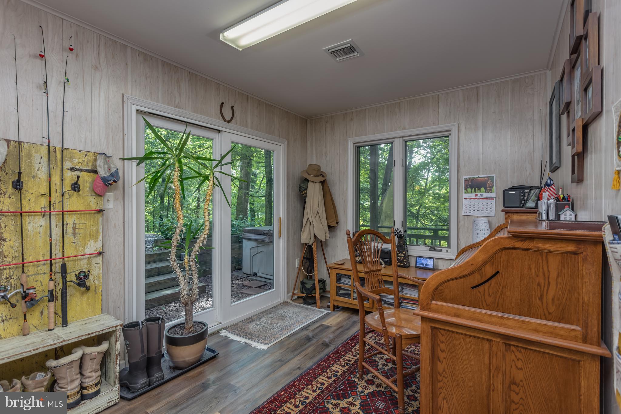 379 Wintergreen Way Berkeley Springs, WV 25411 - Photo 26 of 55 a living room with furniture and a window