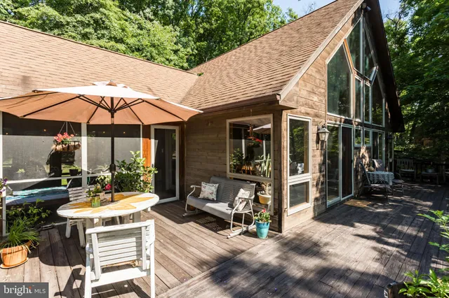 a view of a chairs and table in the patio