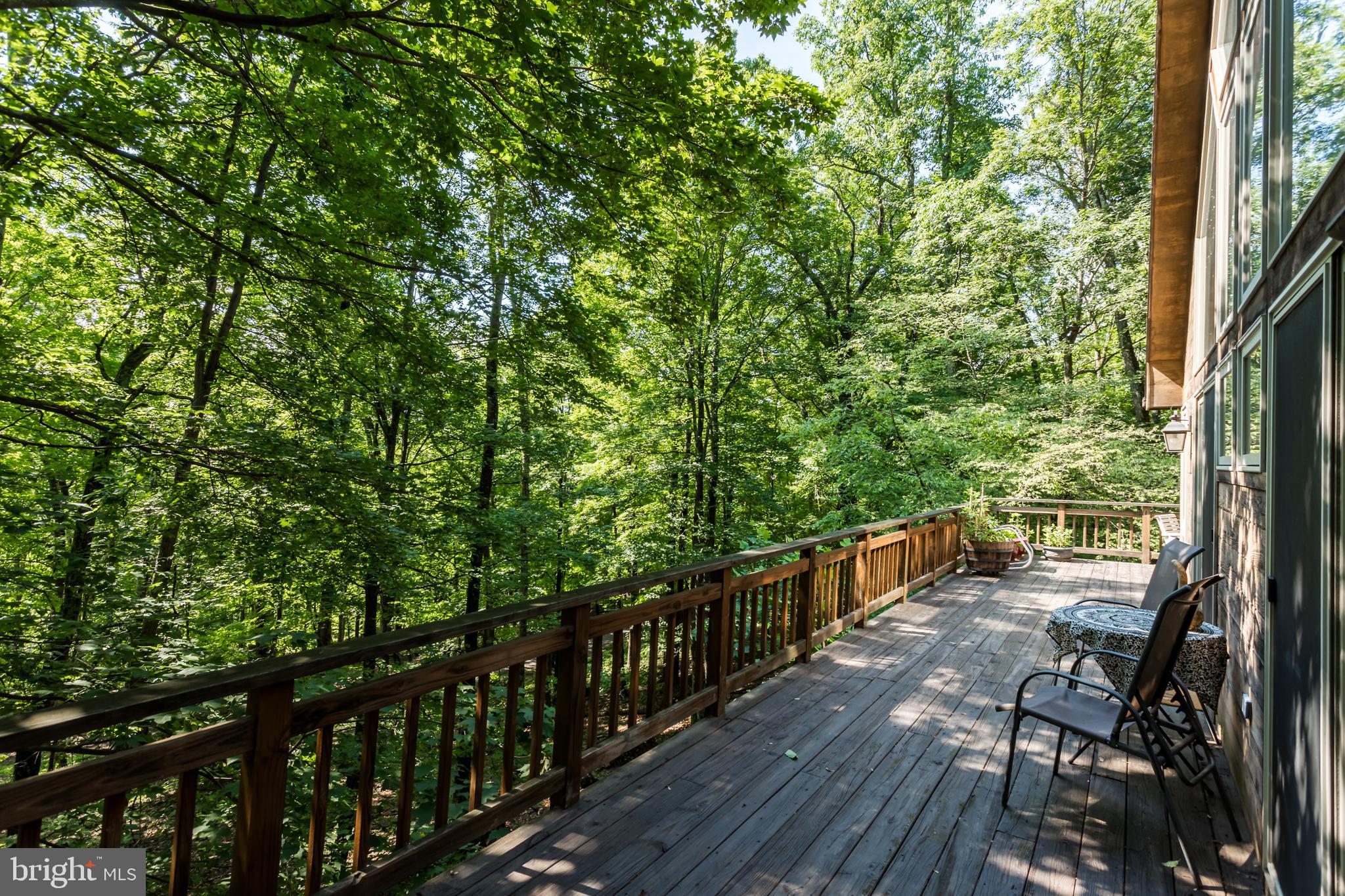 379 Wintergreen Way Berkeley Springs, WV 25411 - Photo 40 of 55 a view of balcony with furniture and wooden deck