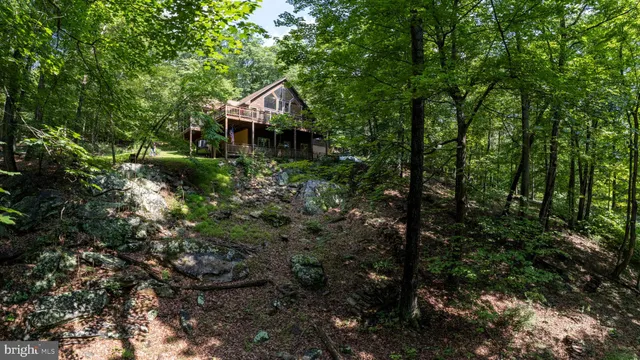 a view of balcony and yard
