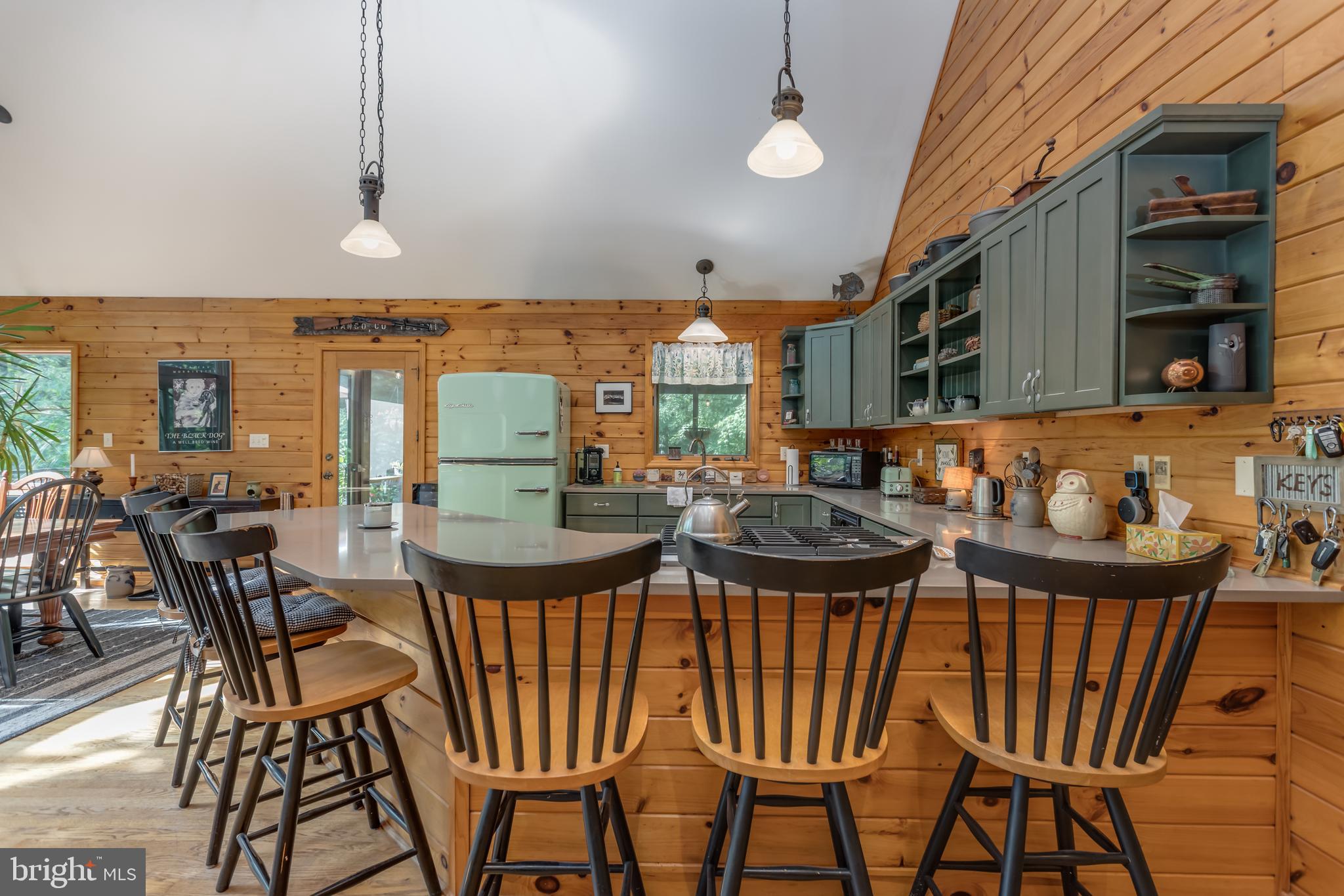 379 Wintergreen Way Berkeley Springs, WV 25411 - Photo 5 of 55 a view of a dining room with furniture window and wooden floor