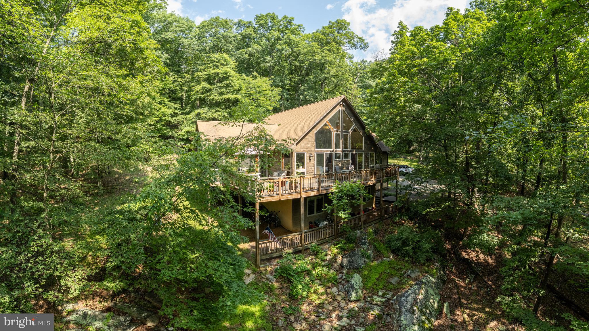 379 Wintergreen Way Berkeley Springs, WV 25411 - Photo 52 of 55 a aerial view of a house with a small yard