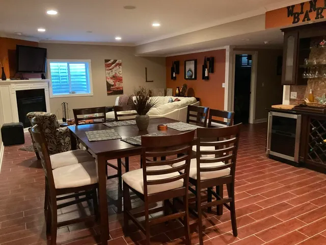 a kitchen with a sink and a refrigerator