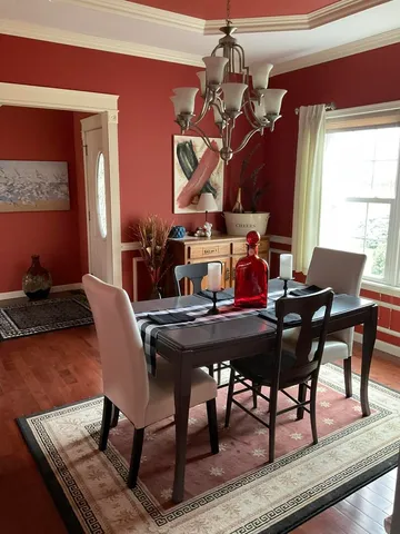a view of a dining room with furniture