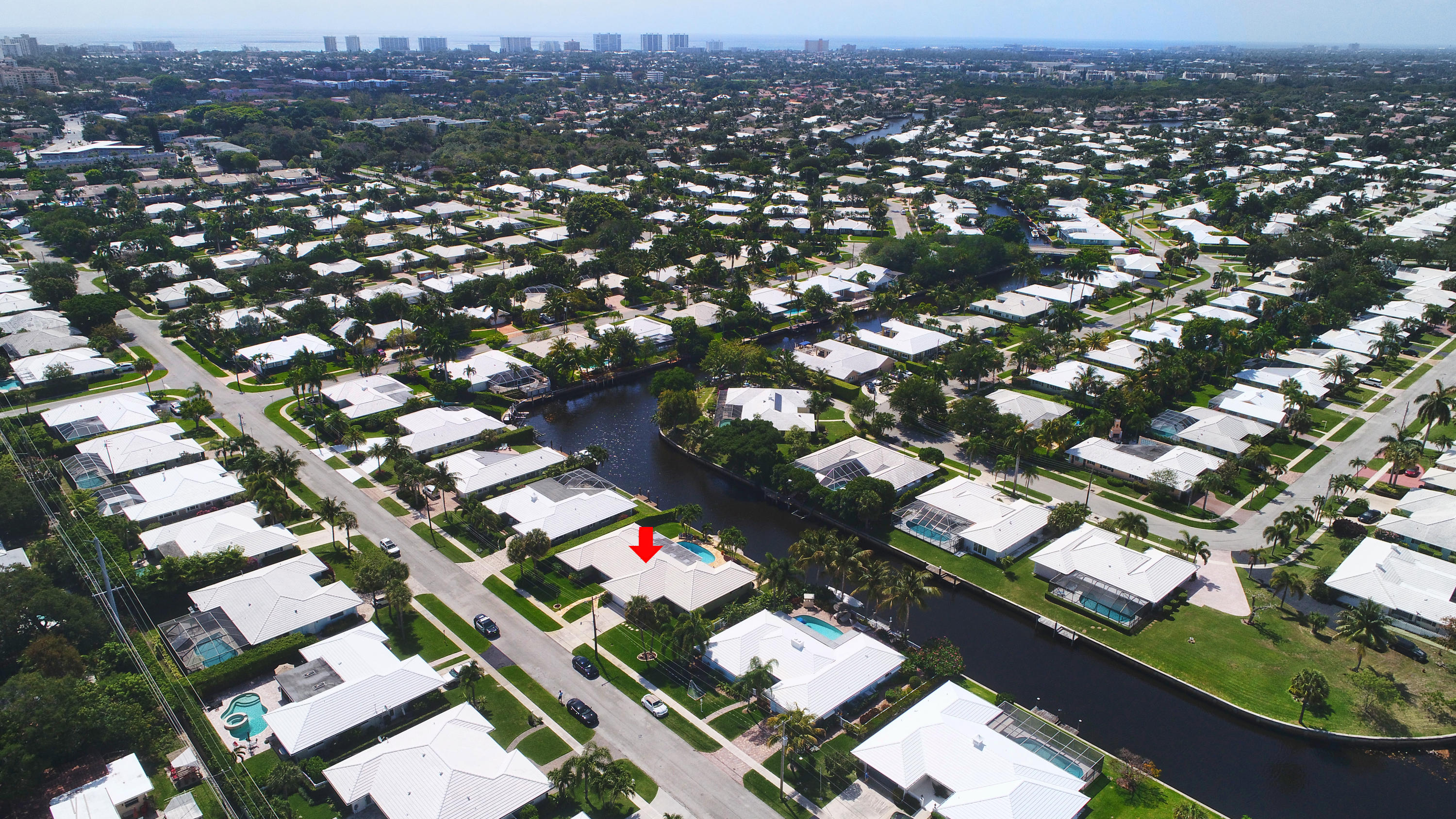 736 Apple Tree Lane Boca Raton, FL 33486 - Photo 38 of 43 an aerial view of a city with lots of residential buildings