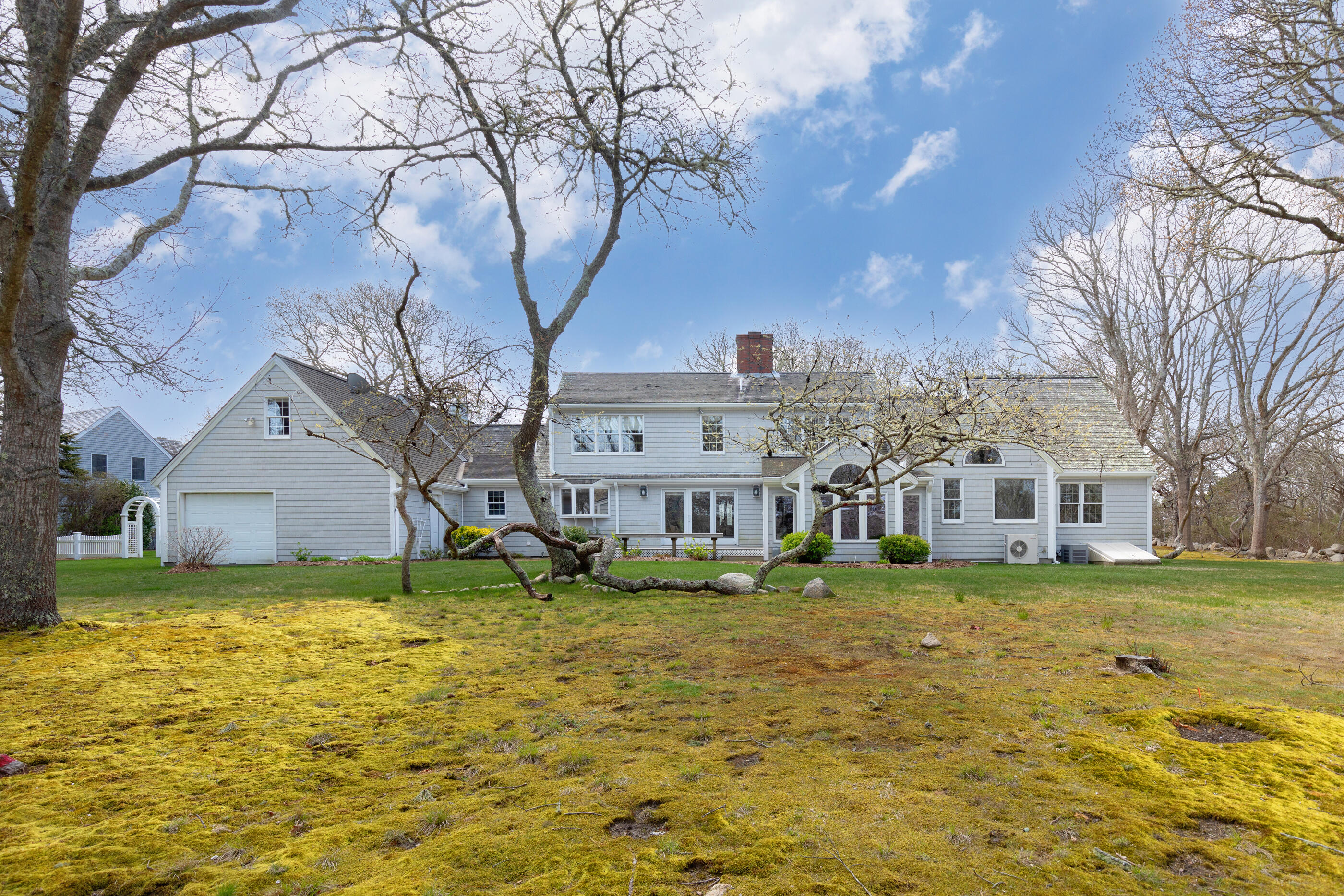 5 Shepherds Quay Brewster, MA 02631 - Photo 11 of 67 a view of a house with a yard