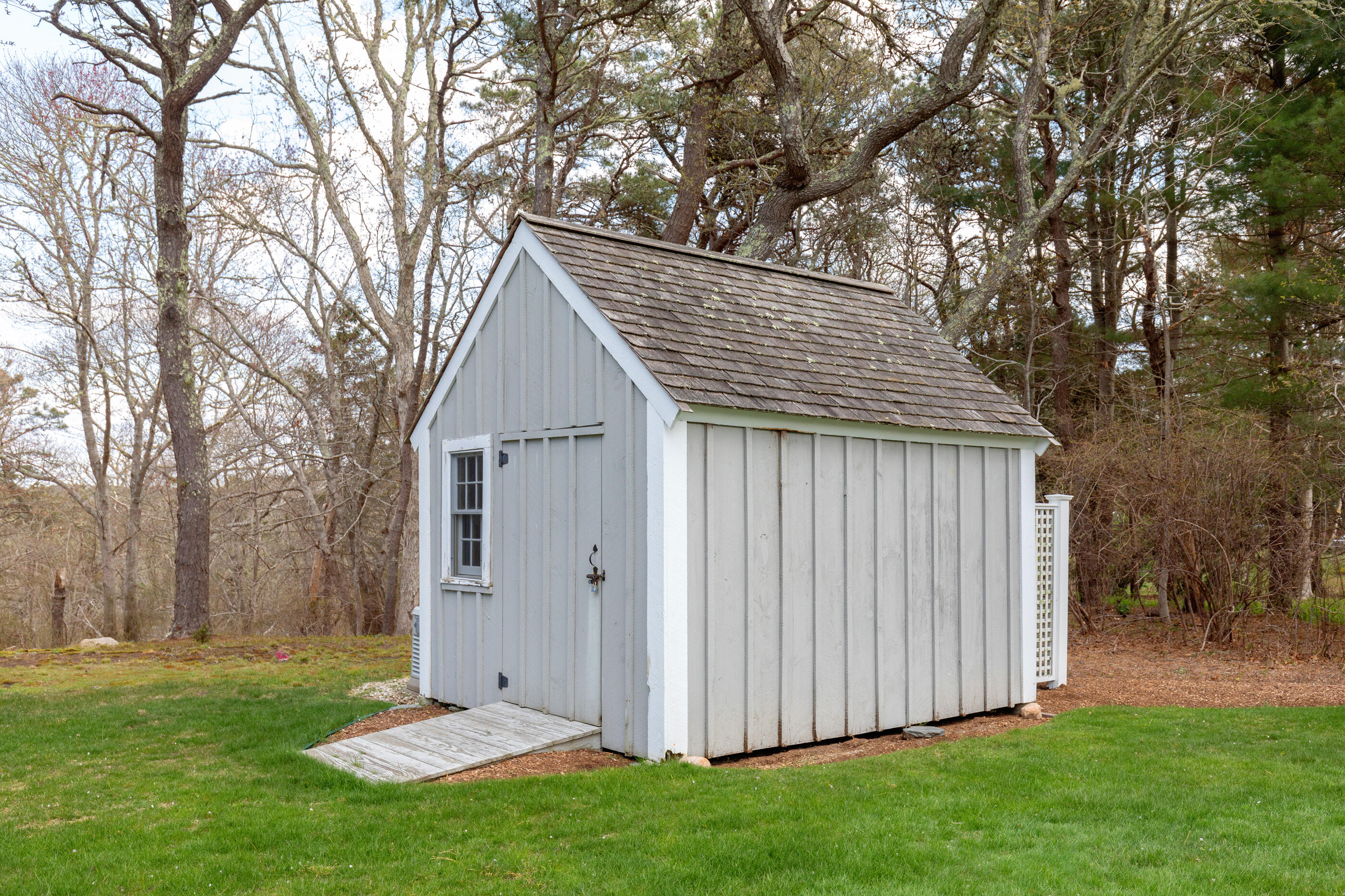 5 Shepherds Quay Brewster, MA 02631 - Photo 14 of 67 a view of backyard of house with green space