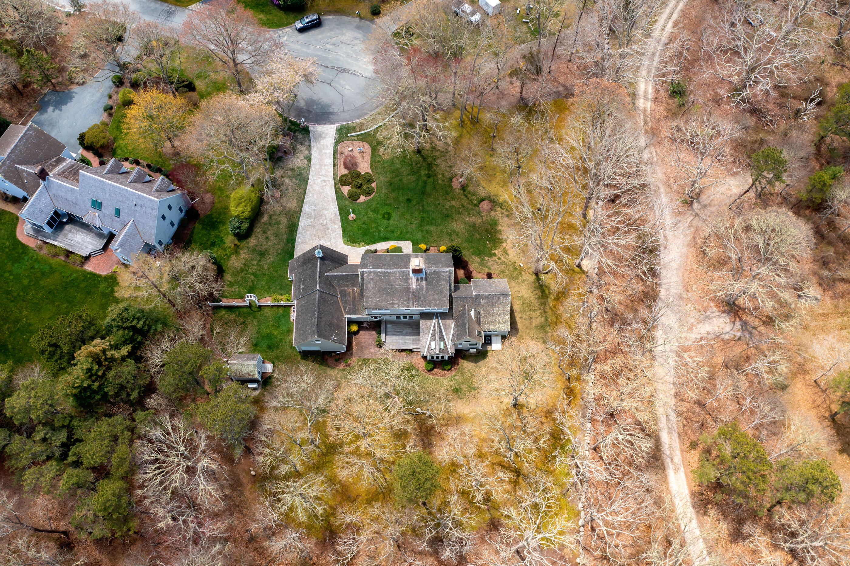 5 Shepherds Quay Brewster, MA 02631 - Photo 16 of 67 an aerial view of a house with a yard and wooden fence