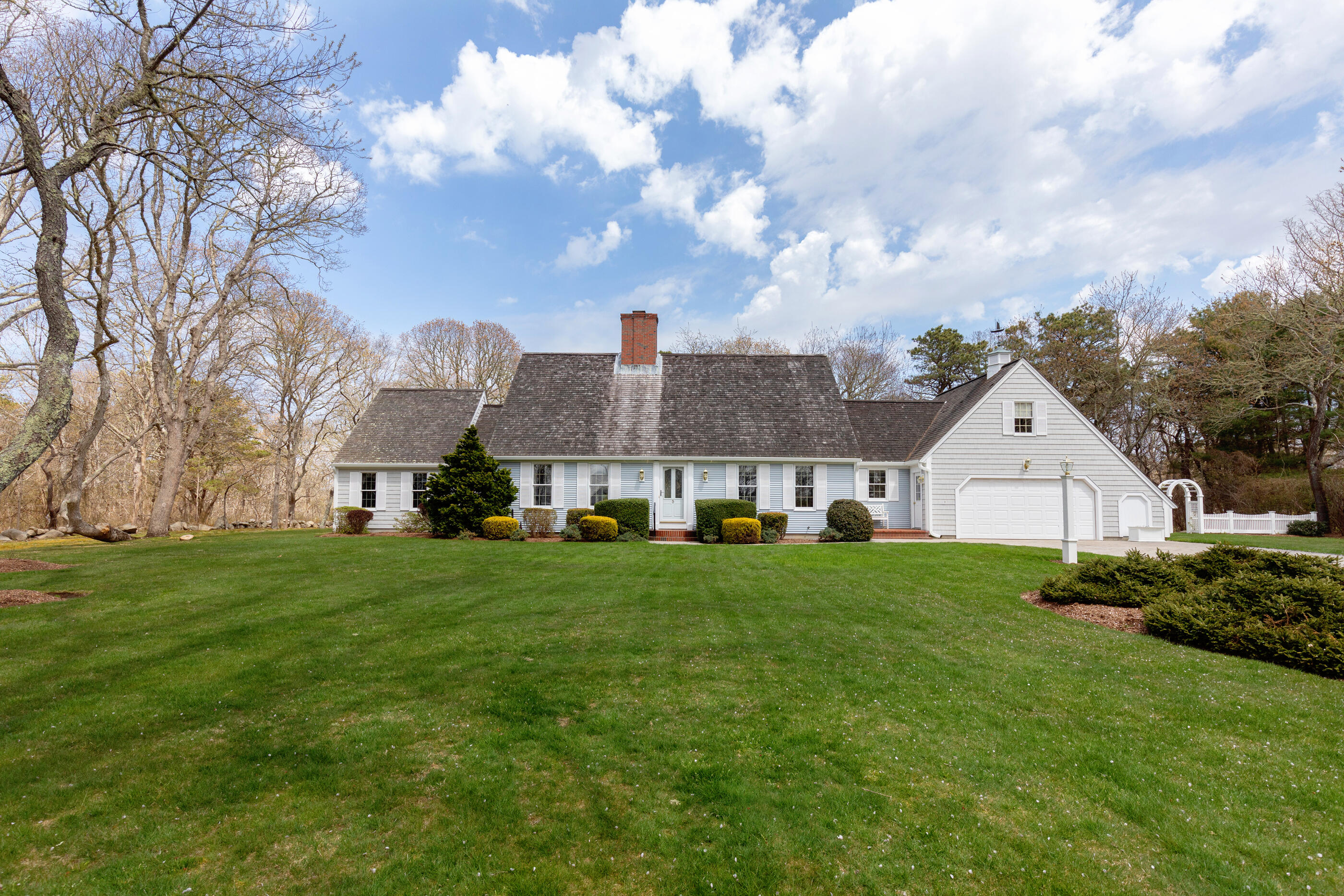5 Shepherds Quay Brewster, MA 02631 - Photo 2 of 67 a view of a big house with a big yard and large trees