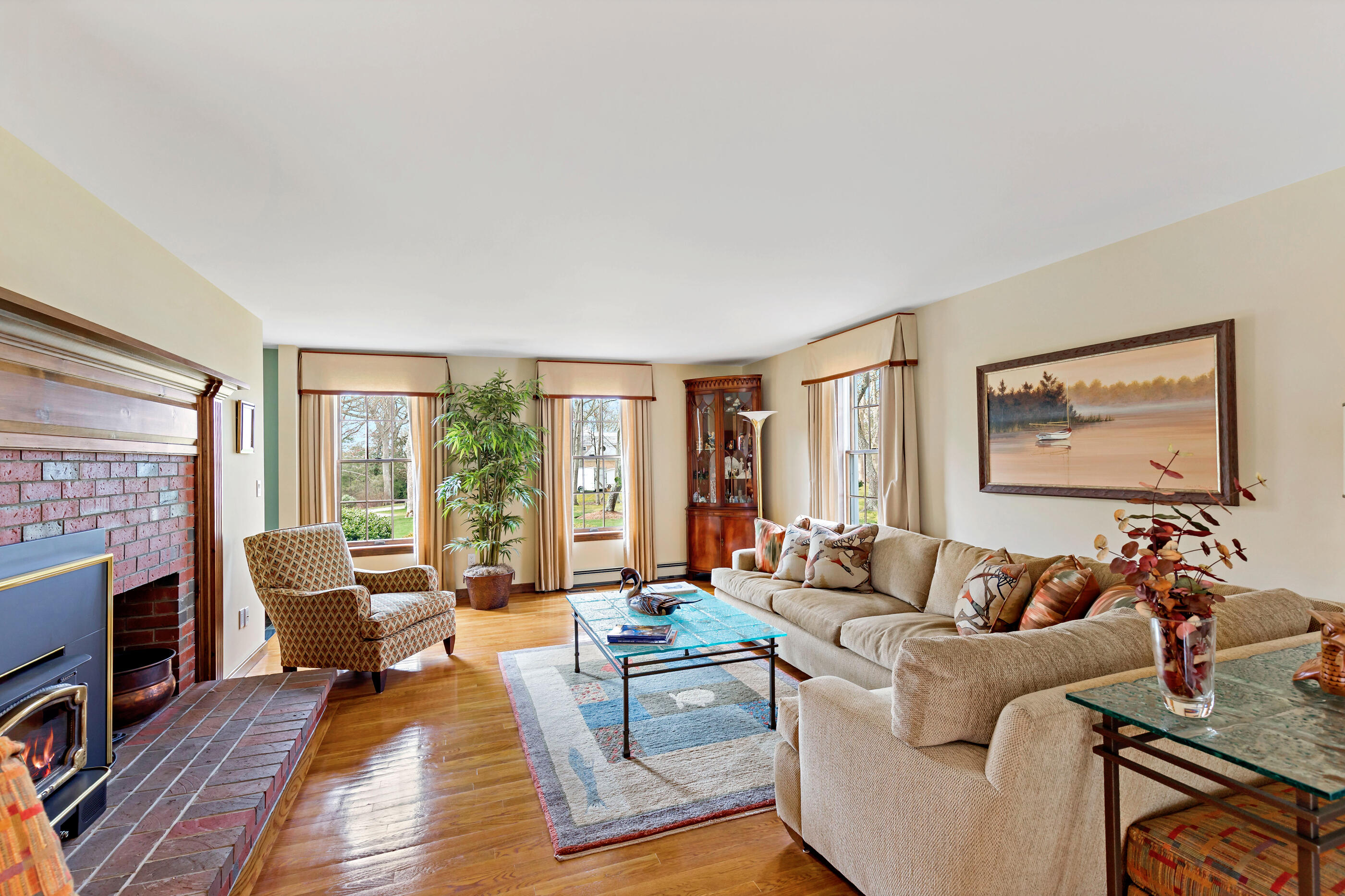 5 Shepherds Quay Brewster, MA 02631 - Photo 25 of 67 a living room with furniture and a fireplace