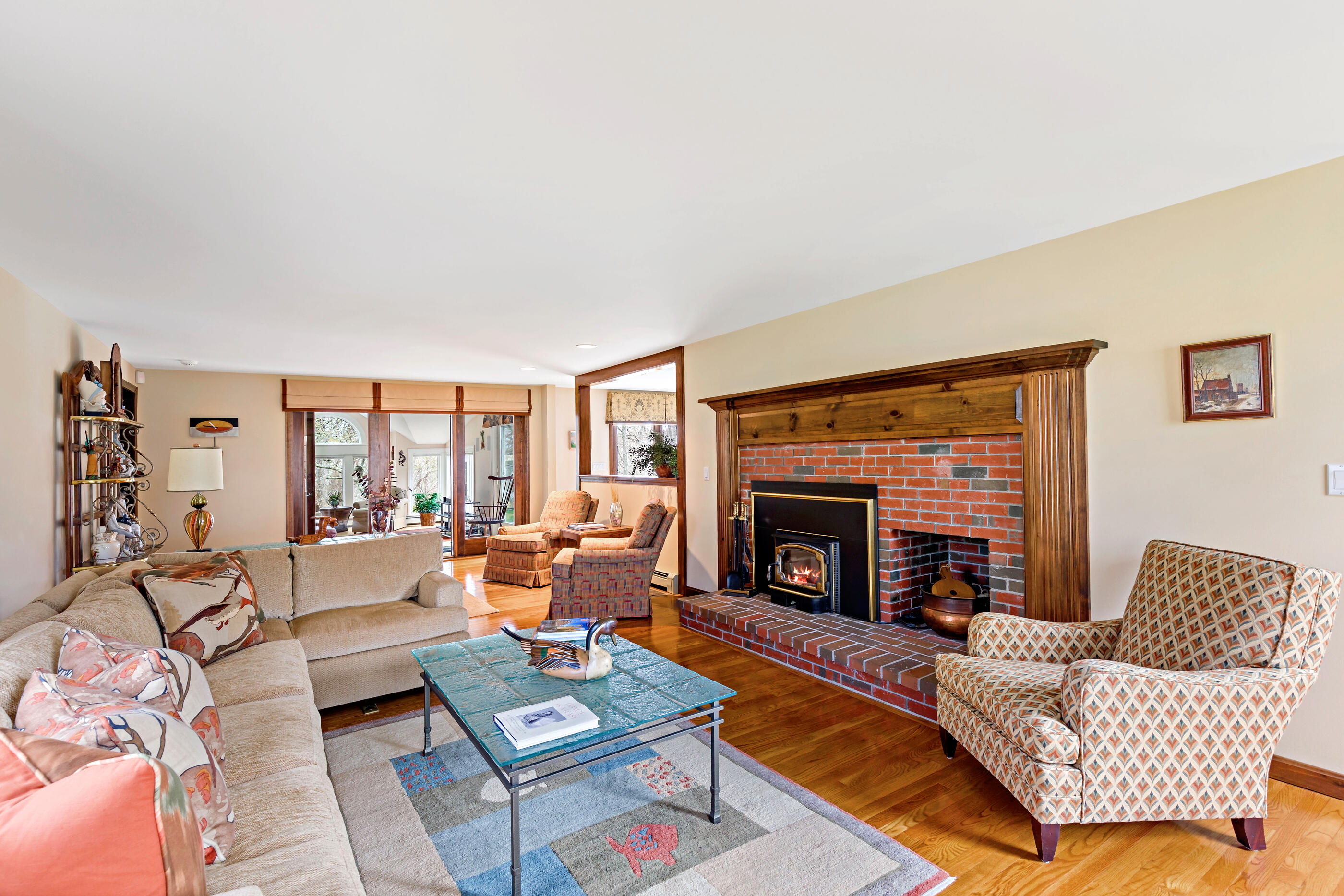 5 Shepherds Quay Brewster, MA 02631 - Photo 26 of 67 a living room with furniture and a fireplace